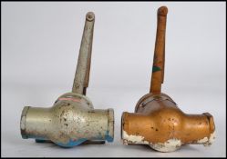 A pair of vintage 1950's ' The Briton ' enamel painted door closes, each with original makers