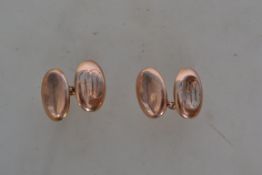 A pair of vintage hallmarked 9ct gold gentleman's cufflinks (cuff links) having oval monogrammed