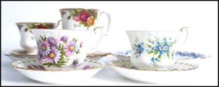 A Royal Albert Old Country Roses tennis set together with Royal Albert cup and saucers in Forget