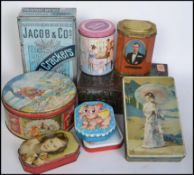 A collection of vintage advertising point of sale shop display tins to include Jacobs, Edward Sharp,