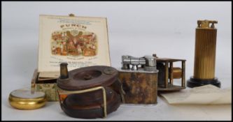 A collection of items to include a vintage 20th century brass fishing reel by T. Cooke & Sons, a