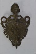 An unusual Anglo - Colonial Indian  white metal - brass metal Indian chastity belt buckle of