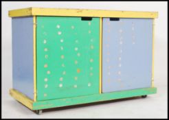 A 20th century Industrial beech wood school cupboa