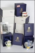 Royal Worcester jugs - a set of twelve 250th Anniversary jugs decorated in 18th to 20th Century