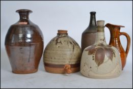 A good group of vintage 20th century studio pottery to include an Ewenny jug, vases, believed Tremar