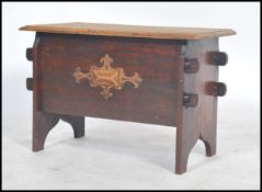 A vintage early 20th century oak blanket box coffe