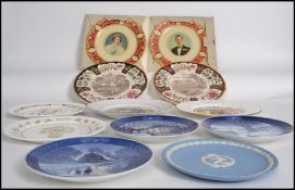 A collection of 11 boxed ceramic collectors plates to include examples by Masons, Coalport, Spode