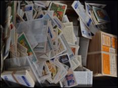 A large collection of cigarette cards dating from the early 20th century to include Wills, Players