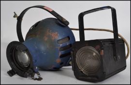 A vintage mid century Strand type theatre / cinema spot light together with another 20th century