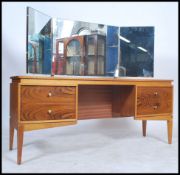 A 1950's teak wood retro dressing table in the man