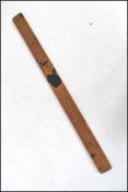 A believed early 19th century wooden rule - measur