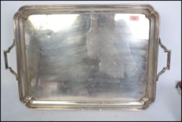 An impressive Edwardian large silver plated salver - butlers tray. Of oversized form with gallery