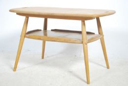 A rare vintage Ercol butler / tray table designed