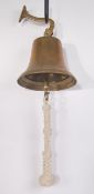 A good mid century brass school bell with wall mou