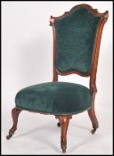 A good Victorian mahogany ladies armchair. Raised on cabriole reeded legs with a good deep turquoise