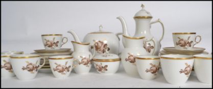 A stunning 20th century Copenhagen porcelain tea service in a gorgeous chintz pattern to include