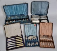A collection of vintage 20th century cased silver plated  flatware to include desert cutlery, fish