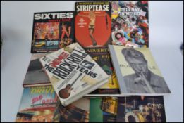 A good collection of Music and popular culture books to include A Pictorial History Of Striptease.