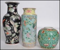 Three pieces of 20th century Chinese ceramic vases each of a different colourways. Measures: 36cm