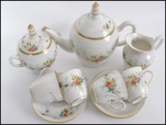 A believed 19th century porcelain tea service bear