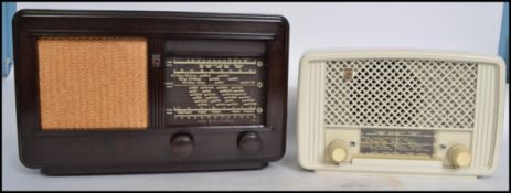 A vintage mid 20th century bakelite valve radio  model no M381A by Phillips together with a white