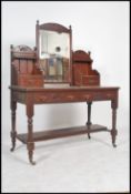 An Edwardian mahogany duchess dressing table raised on turned legs with reeded drawers to front.