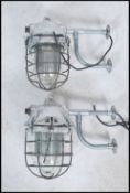 A pair of Industrial ' extreme condition ' heavy industrial bulkhead lights. Each with glass pendant