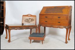 A mid century Chinese camphor wood bureau desk on stand. Carved details with cabriole legs