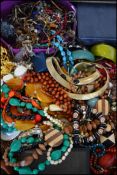 A large collection of costume jewellery to include pearl necklaces, brooches, bracelets, earrings,