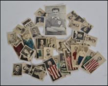 A collection of pre war cigarette cards all pertaining to footballers, some in colour to include one