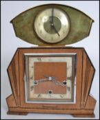 A vintage 20th century Art Deco mantel clock together with a retro faux onyx mantel clock.