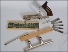 A Stanley Combination plane No.50 complete with cutting tools shaving deflector and bottom adjusting