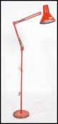 A mid century retro anglepoise floor standing desk lamp marked ICHF Denmark. The terraced base in