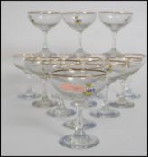 A group of 14 vintage 20th century retro 1970s Babycham glasses having shaped bowls with cylindrical