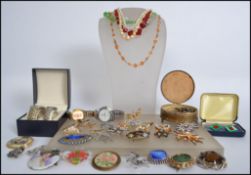 A collection of costume jewellery to include green glass deco necklace choker, red glass necklace