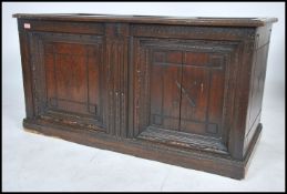 A Victorian 19th century carved oak Cassone - chest coffer. Raised on a plinth base with carved