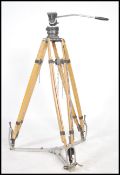 A good mid century tv / film cinema wooden camera tripod stand complete with the metal bracket