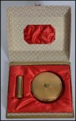 A vintage Art Deco compact and lipstick holder ' Caprice ' set by Kigu , finished in gilt
