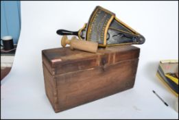An exceptional cased Marmalade slicer with ebony and gilt notation / decoration. Complete in the