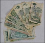 A collection of Vintage British bank notes, several pond notes of differing era's and 10 shilling