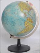 A retro 1983 A retro 1980's Danish made Scan Globe terrestrial desk globe, supported by a chrome