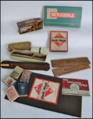 A collection of vintage games and measures etc ( please see illustrations ) Measures: 49cm wide.