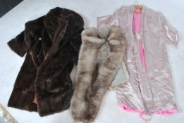 A mid century ladies vintage fur coat, possibly mink having a lined interior ( please see images )