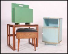 A dealers lot of furniture to include a retro footstool with vinyl top, a green painted magazine