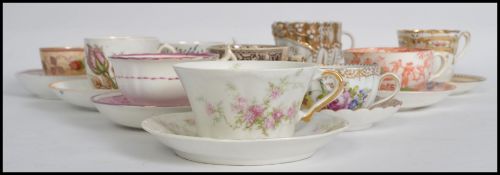 A collection of 10 19th century ceramic porcelain cups and saucers to include examples from Dresden,