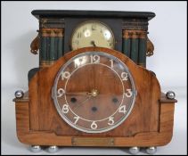 Two vintage 20th century mantle clocks, one being an art deco style clock along with an ebonised