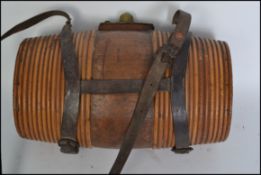 An unusual large 20th century St. Bernards rescue mountain dog brandy barrel with brass clasp top