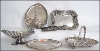 A group of silver plated wares to include a Kaiser Tirol art nouveau oval tray, a trefoil clam