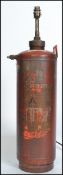 A stunning upcycled 20th century fire extinguisher having a retro conversion into a floor lamp