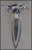 Horse Racing Interest. A contemporary silver Links of London style book mark adorned with